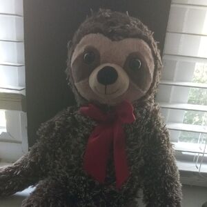 Brown and Red Stuffed Sloth Animal Toy